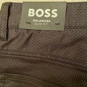 Brand new with all tags!  Hugo Boss Delaware black jeans